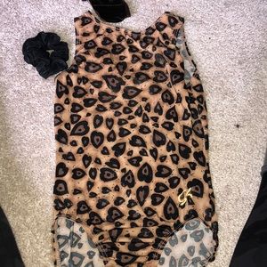 gold and black cheetah GK gymnastics leotard